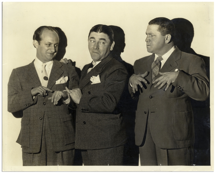 10 x 8 Glossy Publicity Photo From 1935 -- Larry and Moe showing off their wedding rings to a ringless Curly -- Very Good Condition